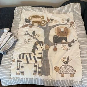 Crib quilt with skirt